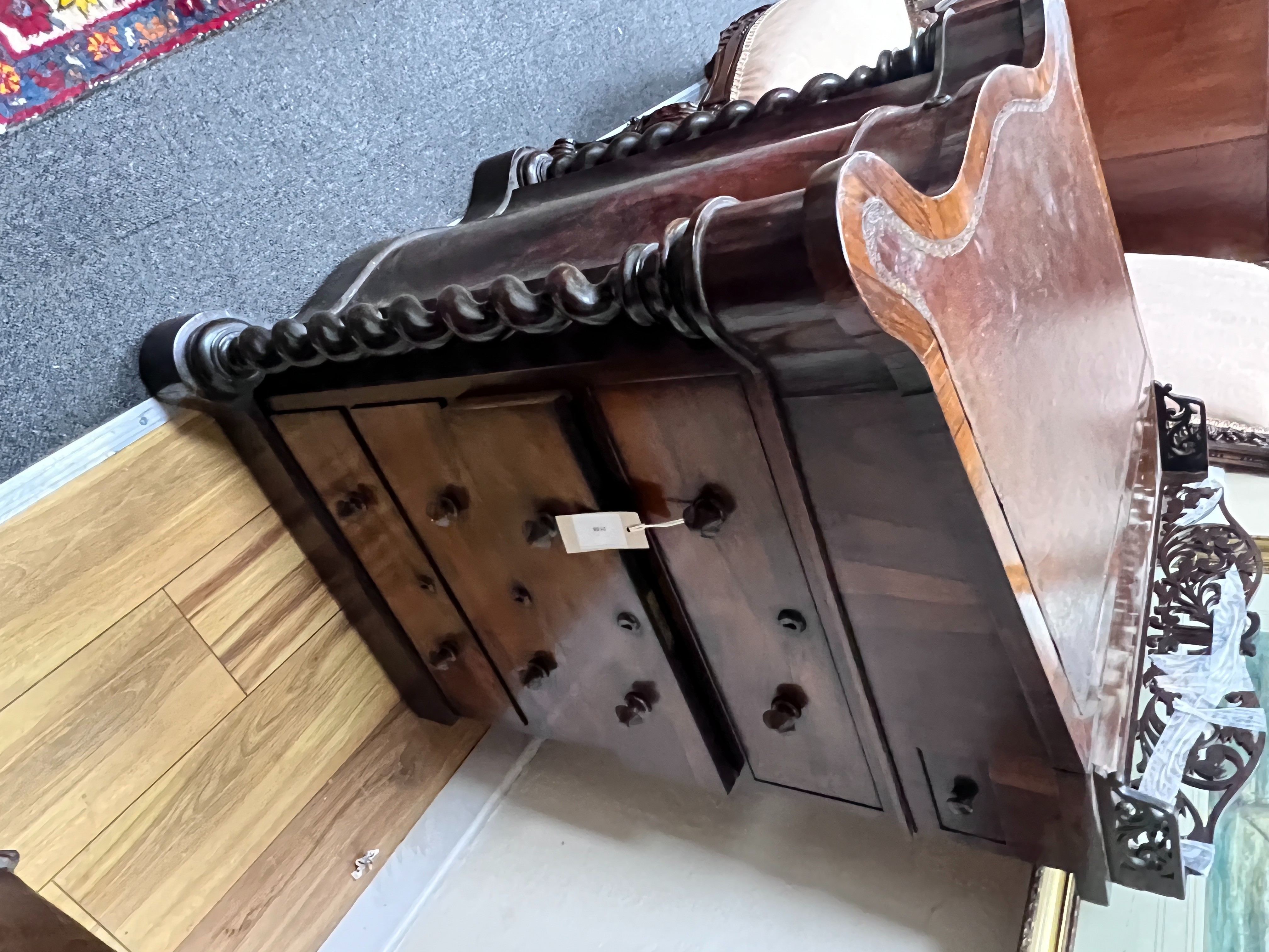 An early Victorian rosewood serpentine fronted Davenport, width 63cm, depth 58cm, height 92cm